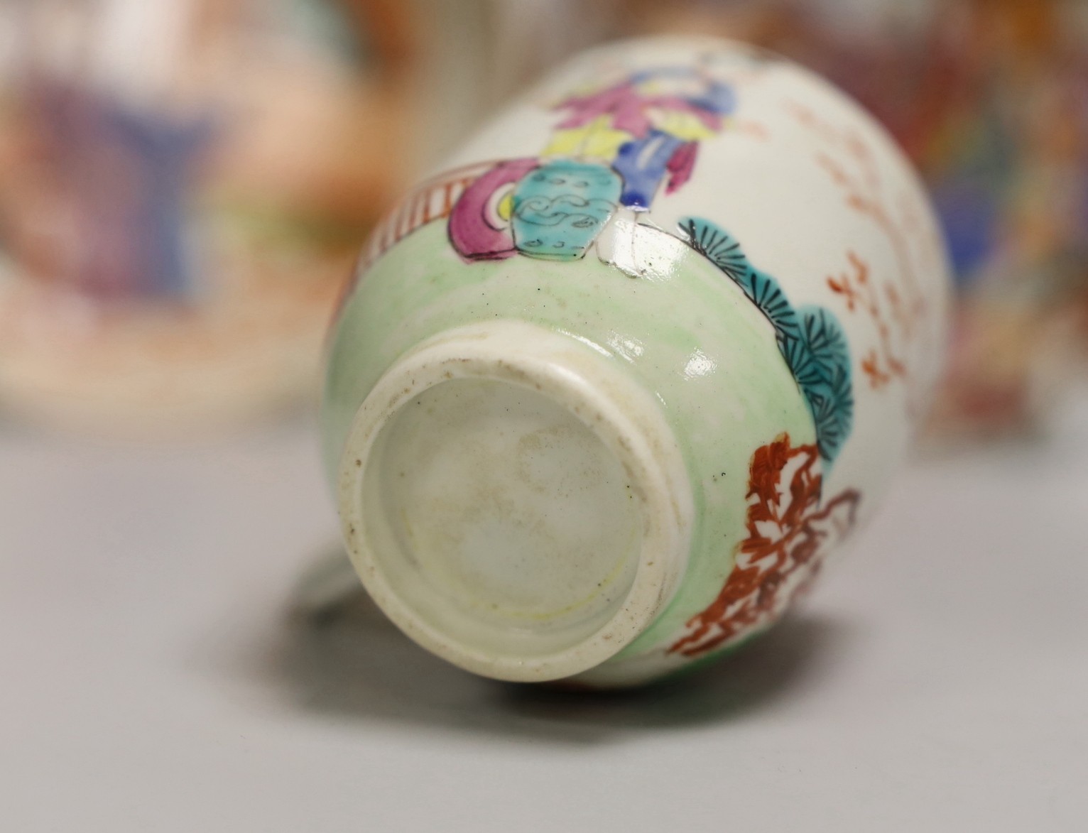 An 18th century Worcester porcelain coffee cup, a later saucer and a Chinese saucer, cup 6.5cms high